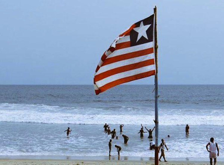 Liberian flag on a beach, Liberian Celebrities, Famous Liberians, 